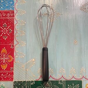 Stainless Steel and Black Whisk by [Brand]